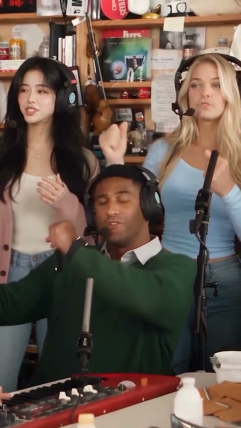 Tiny Desk AI band scene demonstration with a keyboard player and two backing singers